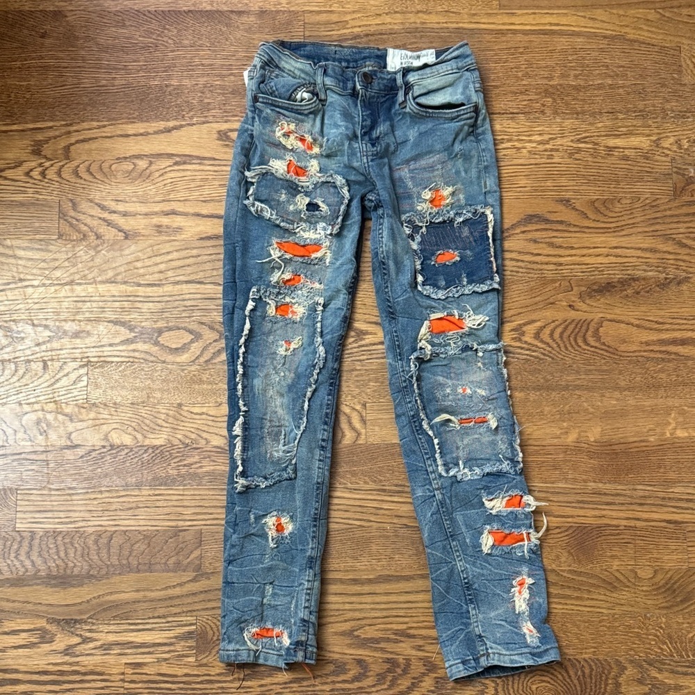 NWOT Evolution In Design Distressed Blue Jeans size 14